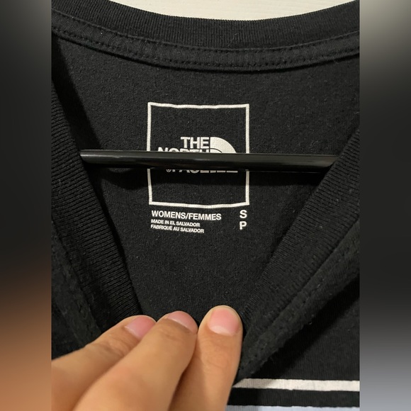 Just a black Northface shirt with the mountain in the front. - Picture 2 of 3